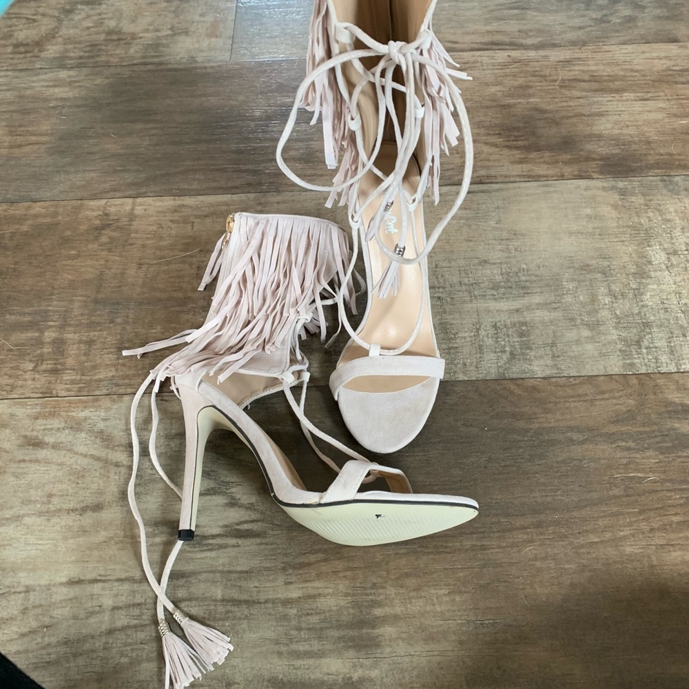 Lace up fringe heels